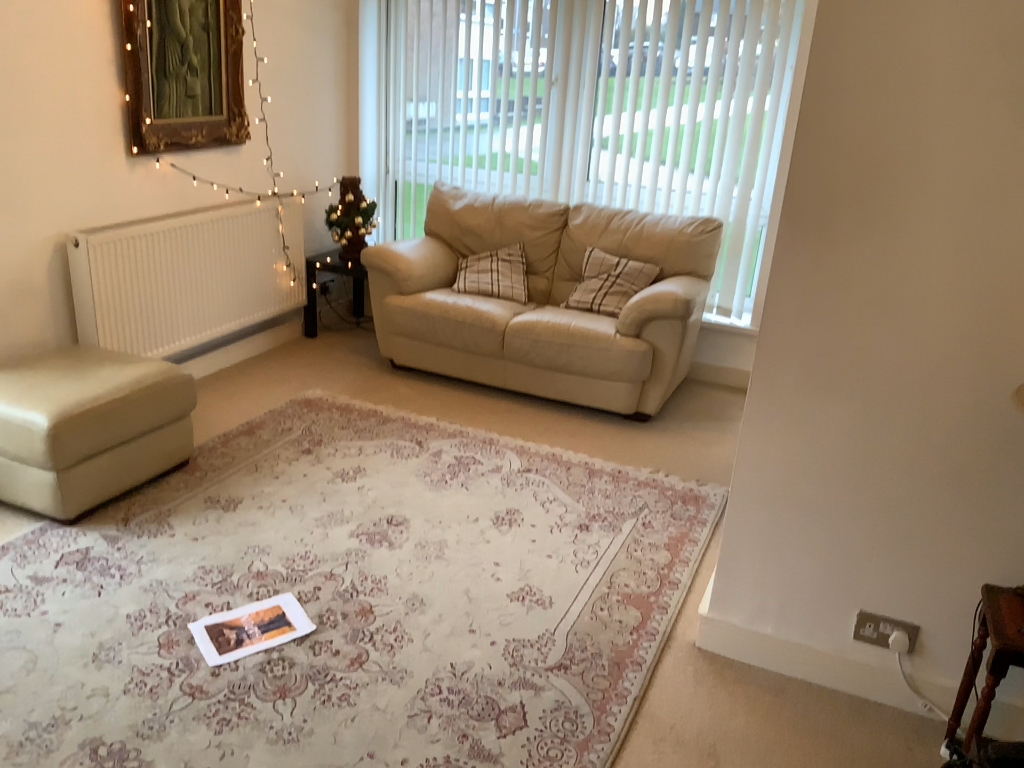 Reference photograph of the first living room