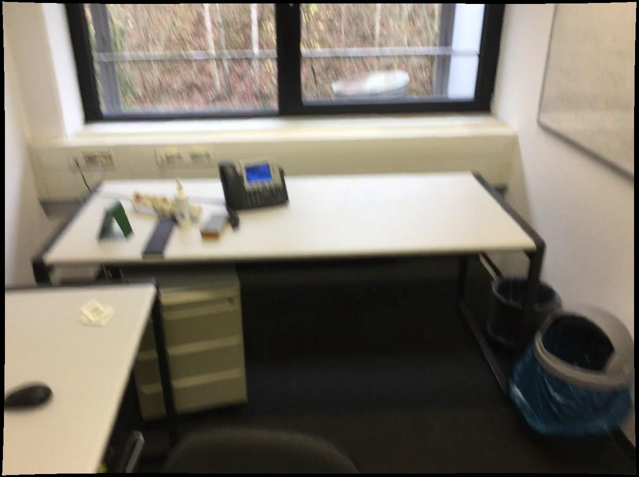 Reference photograph of the desk beside a window